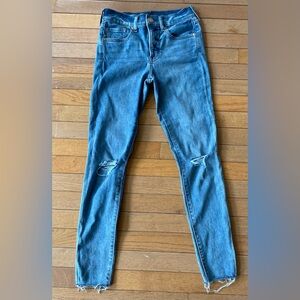 NWOT Express mid-rise distressed frayed hem skinny jeans